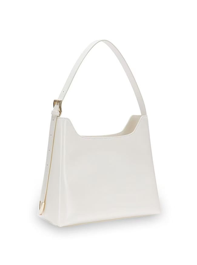 RAIVE Cling Bag in O Cow leather