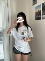 可爱卷边纽扣斜肩上衣